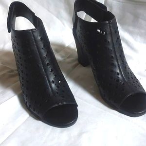 Black man-made sandals with eyelet design